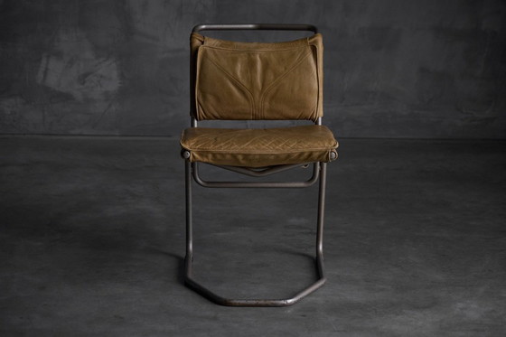 Image 1 of Eetkamerstoel van leer en staal, ontworpen door Raymond Rombouts, België, 20e eeuw.