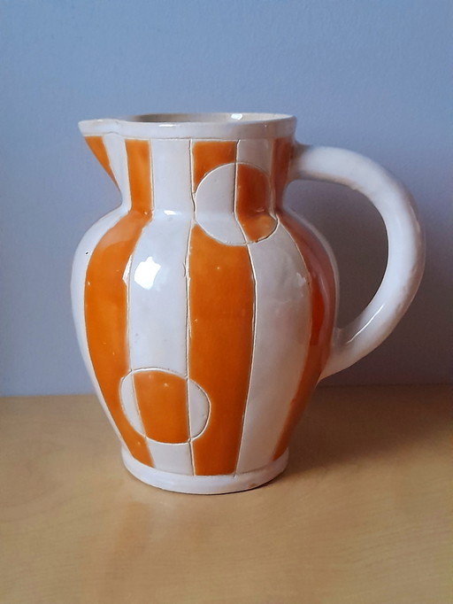 Antique glazed ceramic pitcher
