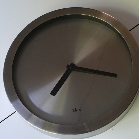 Image 1 of Minimalist wall clock by Zack in brushed stainless steel.