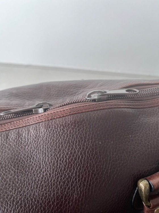 Image 1 of brown leather travel bag from Candy Corson leather atelier Amsterdam