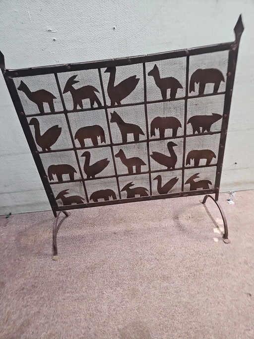 Wrought iron animal fire screen
