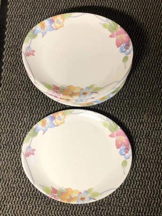 Image 1 of 15 plates with multicolored floral designs