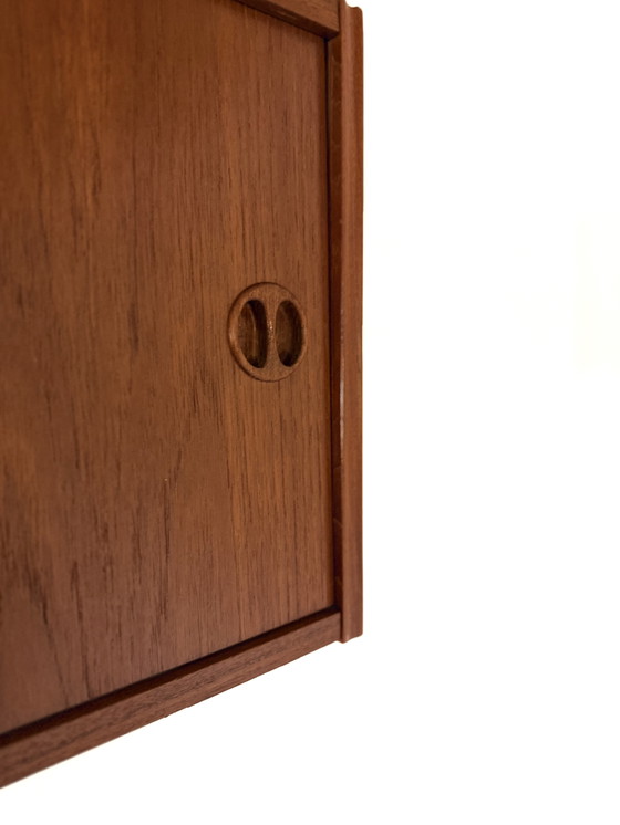 Image 1 of Vintage Danish floating teak wall cabinet '60