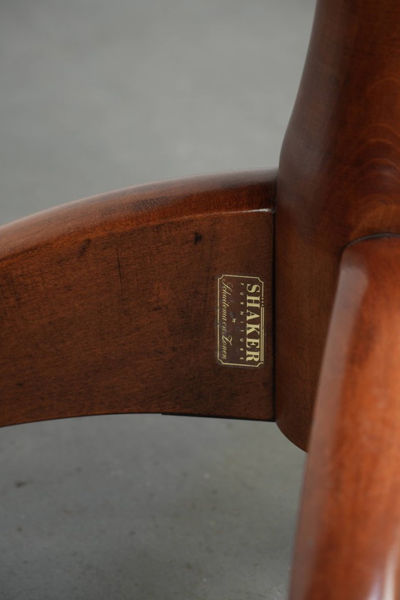 Image 1 of 2x draaibare Schuitema stoel/bijzetstoel/bureaustoel uit de Shaker serie met een cognac kleurige rundleren zitting