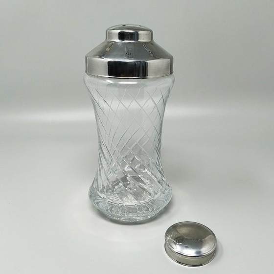 Image 1 of https://madinteriorart.com/collections/tableware/products/1950s-gorgeous-cut-crystal-cocktail-shaker-made-in-italy-copia