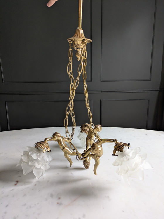 Image 1 of Putti lustroso