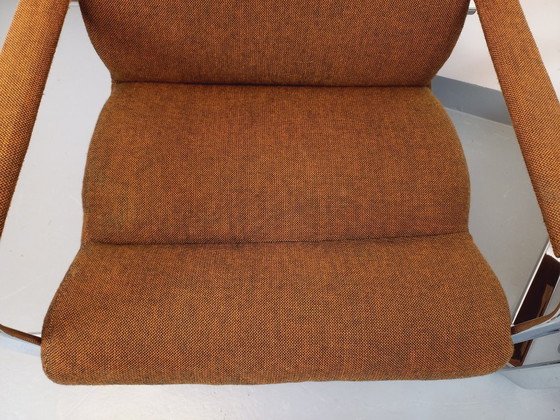 Image 1 of Een paar vintage Eero Aarnio fauteuils voor Framac, uitgevoerd in stof en chroom, uit de jaren 60 en 70.
