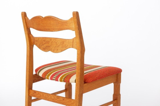 Image 1 of Ensemble de 4 chaises de salle à manger en chêne Henning Kjærnulf | Danois Moderne | EG Mobilier | années 1970