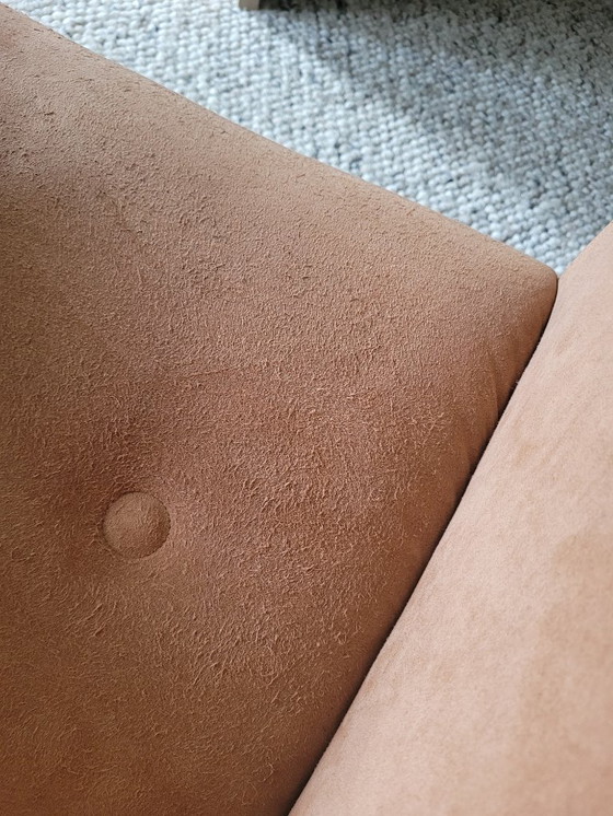 Image 1 of Two Leolux armchairs (Carabas model), one footstool, and three cushions. Upholstery: Alcantara.