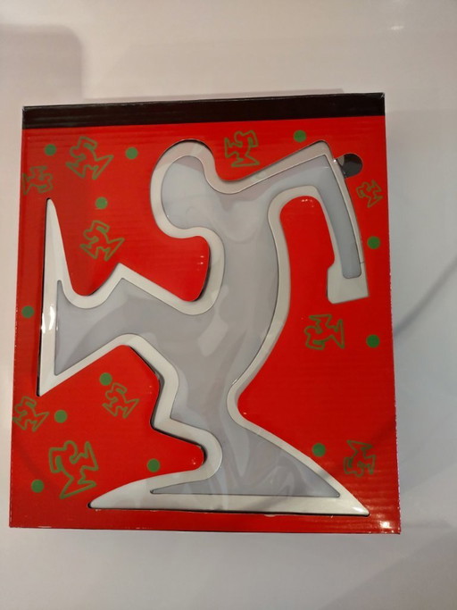 Lámpara Keith Haring La Línea Osvaldo Cavandoli Plateada (Nueva en su embalaje original)