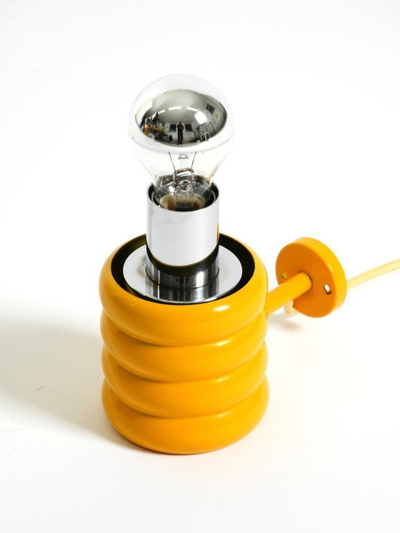 Image 1 of Very rare original 1960s Space Age "Bulb" wall lamp by Ingo Maurer in yellow with a clear glass shade
