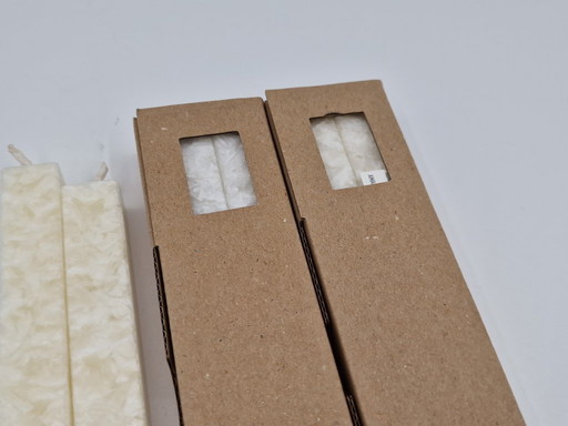 Design candlestick including matching candles marked "Amabient"