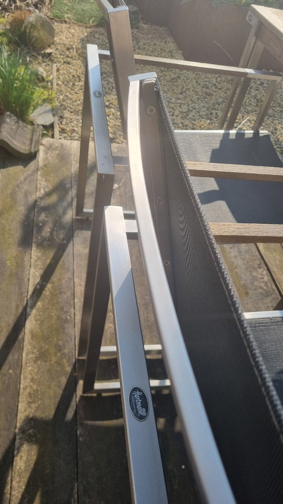 Image 1 of Set da giardino con tavolo in teak e 4 sedie in acciaio inox, realizzato in teak e textilene.