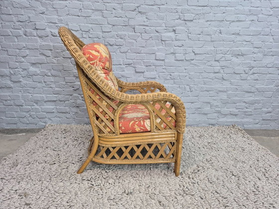 Image 1 of Luxurious Vintage Bamboo & Rattan Armchair with Floral Cushions – Warm Terracotta Tones