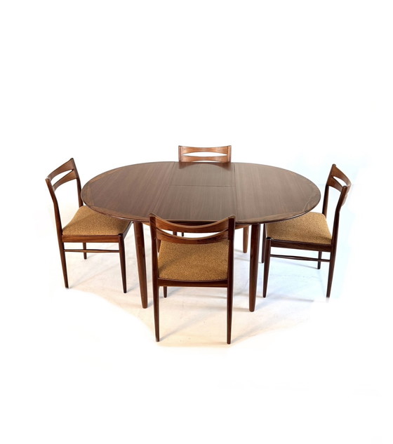 Image 1 of Vintage Rosewood extendable dining table '60