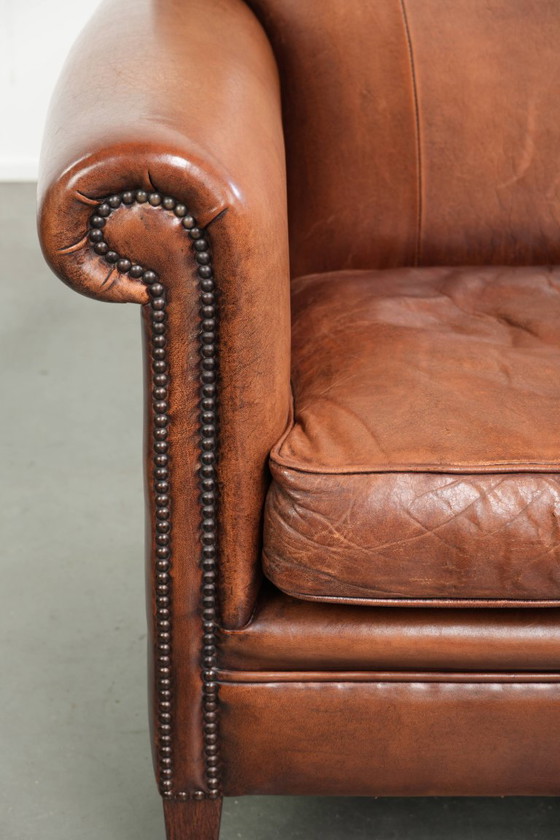 Vintage schapenleren armchair met een comfortabele zit en afgewerkt met siernagels – Fauteuils, Leather (photo 9 of 14)