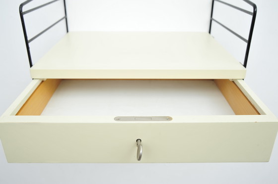 Image 1 of String Regalsystem Schubladenelement in Weiß mit 2 Leitern von Kajsa und Nisse Strinning