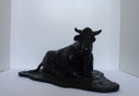 Cow in bronze.