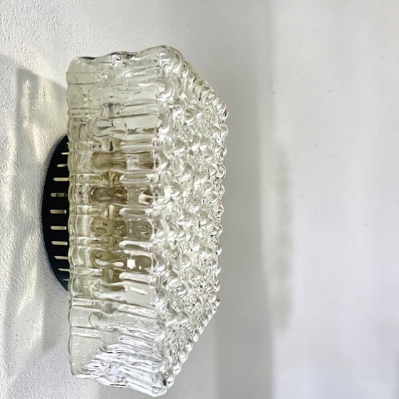 Image 1 of A large flush mount designed for both wall and ceiling application, in the 1970s.  This particular type of fixture tends to sit 