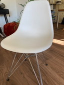 2 white Vitra Eames DSR chairs