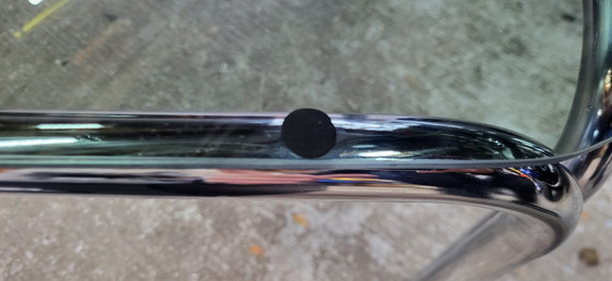 Image 1 of Tavolino da caffè in vetro fumé con struttura tubolare cromata