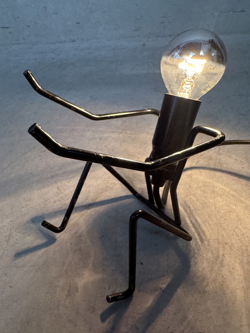 Vintage ‘sitting figure’ lamp