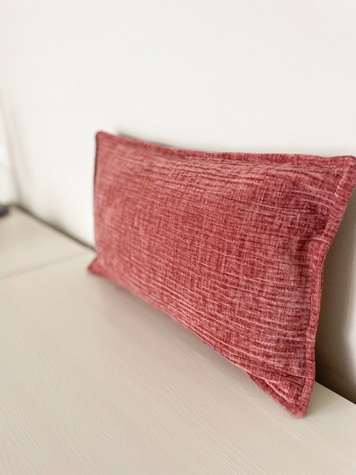 Pink decorative cushion with wave structure - made from upholstery fabric remnants