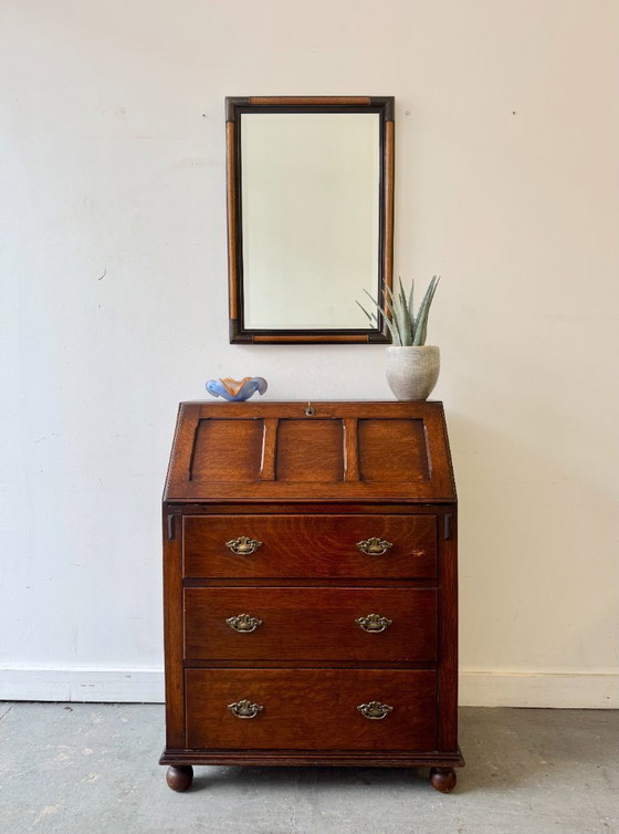 Image 1 of Vintage wandspiegel met afgeschuinde randen in campagnestijl.