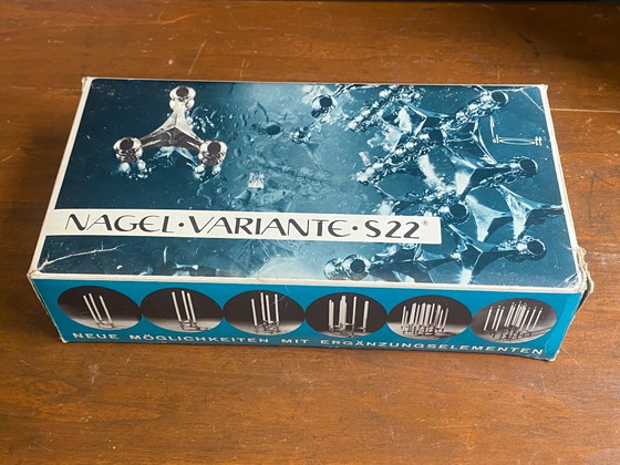 Set van 3 S22 kandelaars en 9 verstelbare NAGEL kaarsen, vintage jaren 70, originele doos (photo 15 of 20)