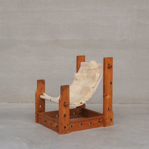 Poltrona a fionda spagnola in legno e tela della metà del secolo scorso