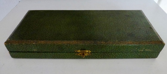 Image 1 of Instrument de service français ancien, appelé "manche à gigot" ou support de gigot d'agneau.