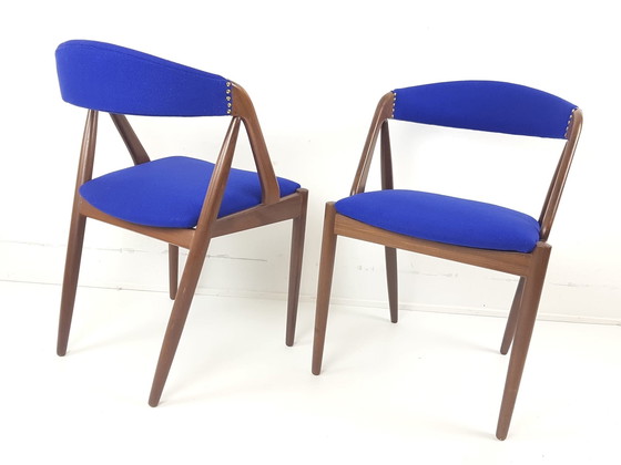 Image 1 of 2 teak stoelen Model 31 Dining Chairs Kai Kristiansen wol De Ploeg nieuw gestoffeerd 