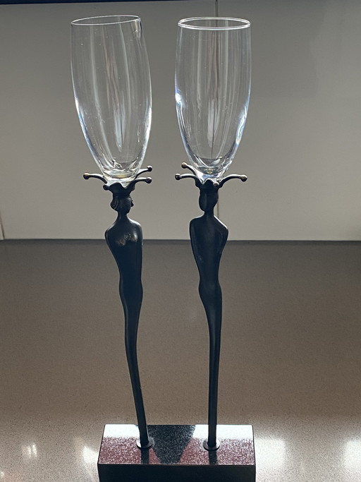 2x champagneflutes op bronzen steel. Arti Hove