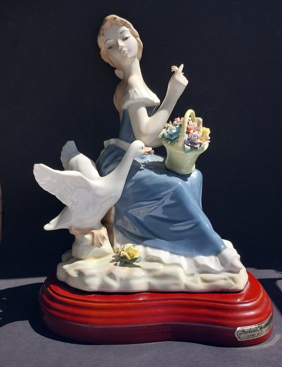 Image 1 of Large porcelain figurine: Lady with a goose and basket of flowers