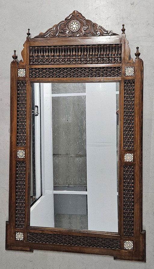 Indian wooden mirror with Moorish shape