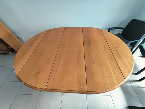 Image 1 of In large adjustable oak table
