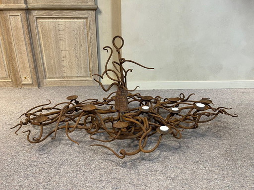 Lampadario portacandele unico in ferro battuto