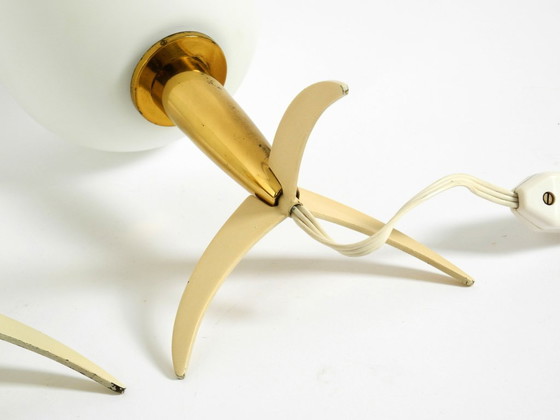 Image 1 of Two Mid-Century Modern rocket table lamps in brass and glass