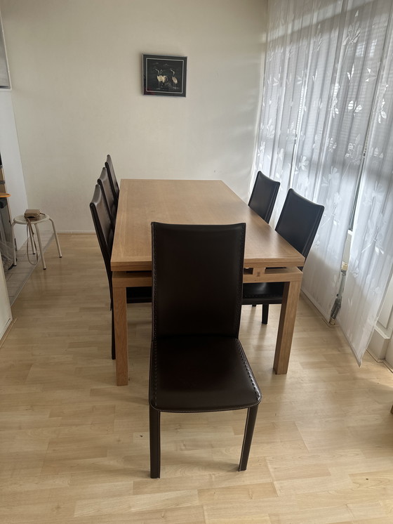 Image 1 of Roche Bobois eettafel set met 6 lederen stoelen