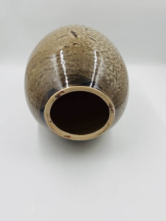 Image 1 of Œuf de dinosaure en céramique