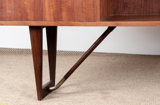 Image 1 of Scrivania danese a forma di "boomerang" in teak e ottone, disegnata da Peter Lovig Nielsen nel 1968.
