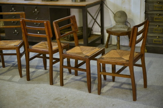 Image 1 of Set van 6 eikenhouten stoelen in de stijl van Pierre Cruège, jaren 1940.