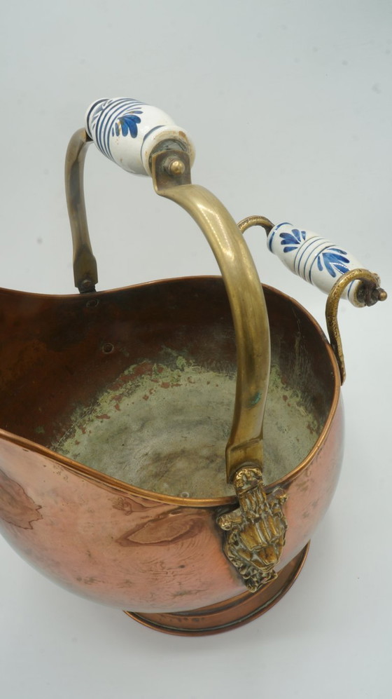 Image 1 of COPPER DUTCH HELMET COAL ASH SCUTLLE BUCKET DELFT BLUE HANDLE BRASS LION HEAD