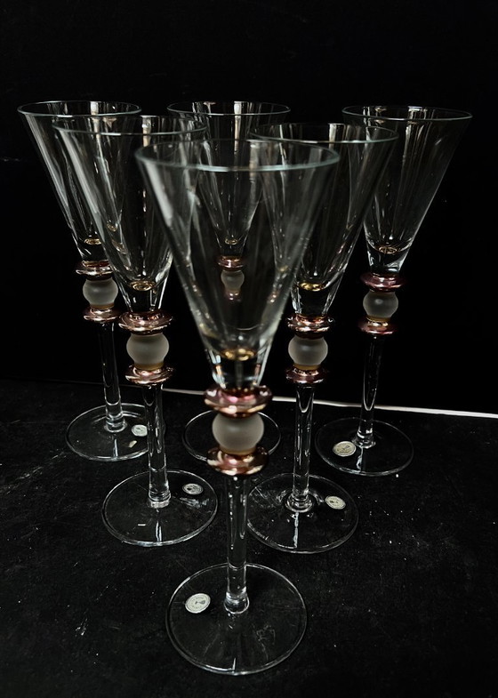 Image 1 of set of 6 champagne glasses clear with gold and dinner glass