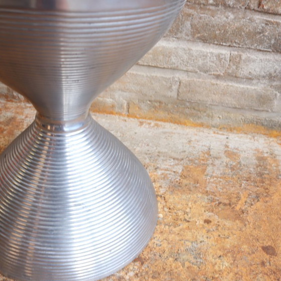 Image 1 of Vintage stool/side table made of cast metal, hourglass shape, chrome trend