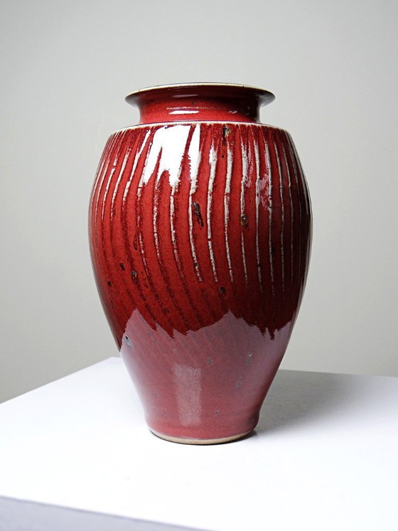 Image 1 of Oxblood-blood glazed stoneware vase with ribs, 20th-century workshop piece