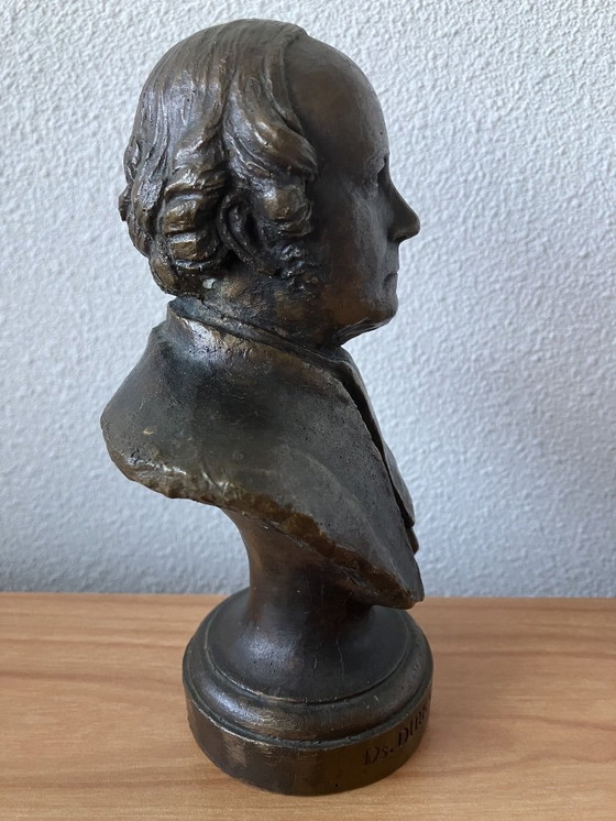 Image 1 of Busto de bronce del reverendo Dirk van der Hoff 1814-1881. por Coert L. Steijnberg