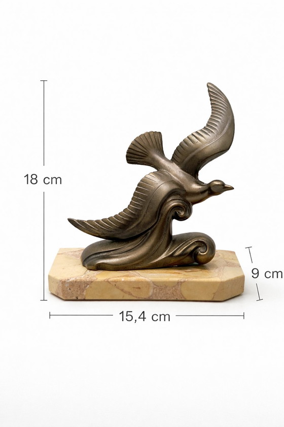 Image 1 of Vintage "Bird in Flight" sculpture on a Brecciated Marble base