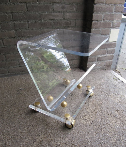 Charles Hollis Jones acrylic glass side table with magazine holder, Italy, 1970s.