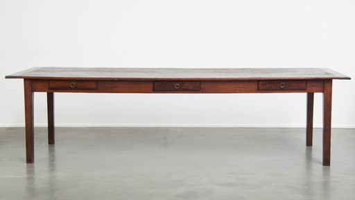 Large antique French farmhouse dining table with a patina